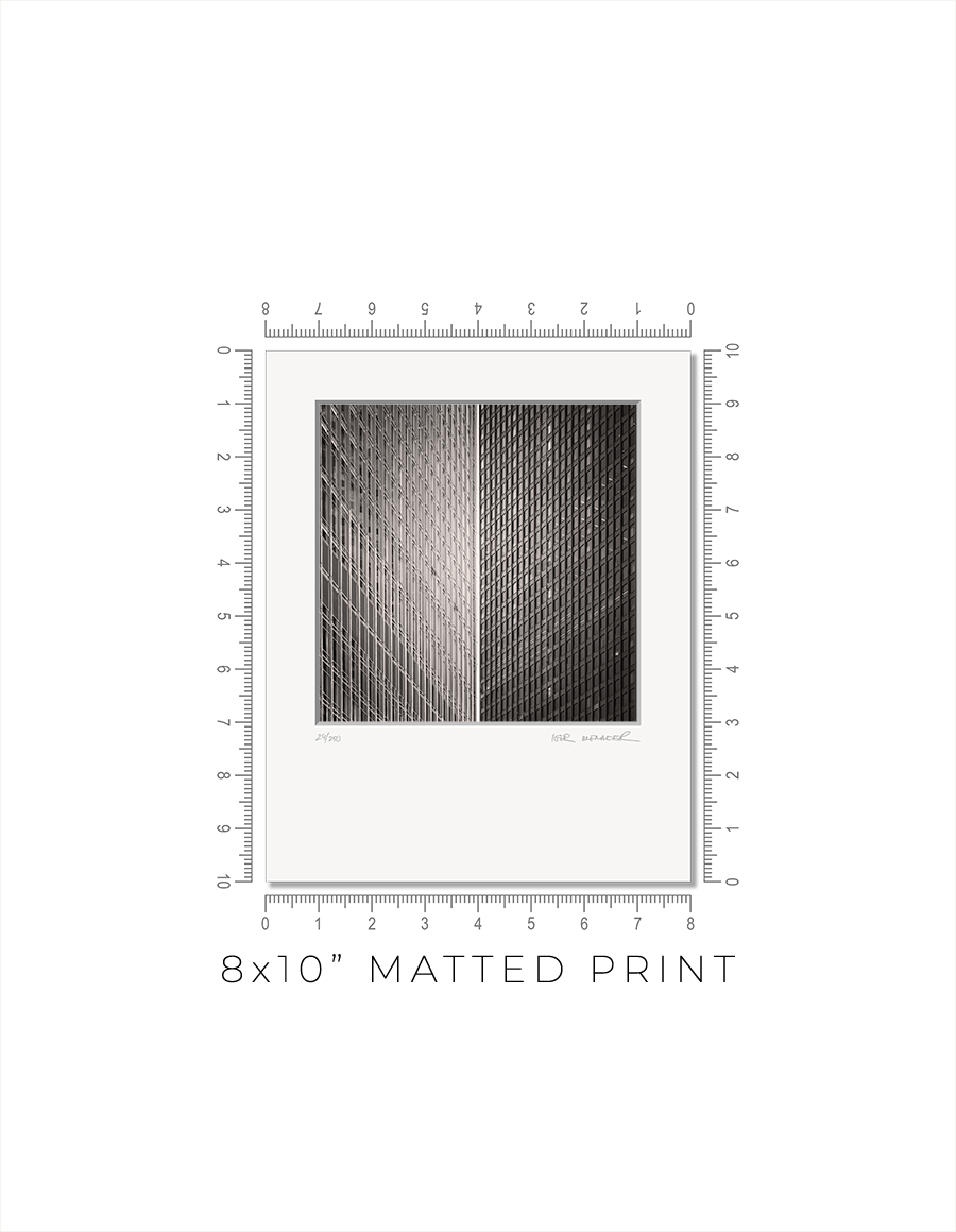 Sliver of Light Between Glass Towers