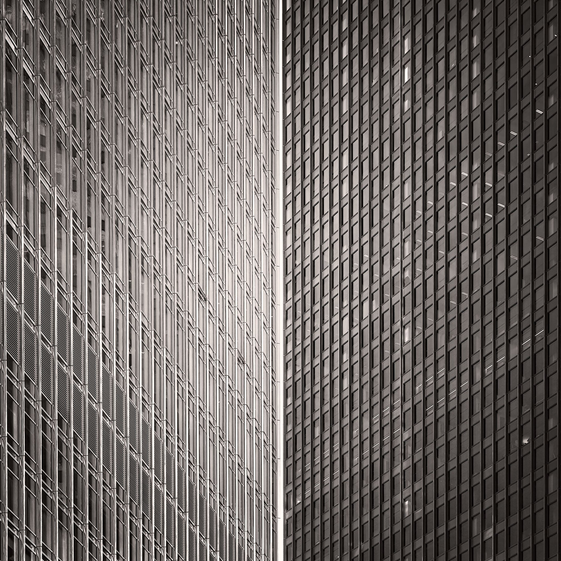 Sliver of Light Between Glass Towers